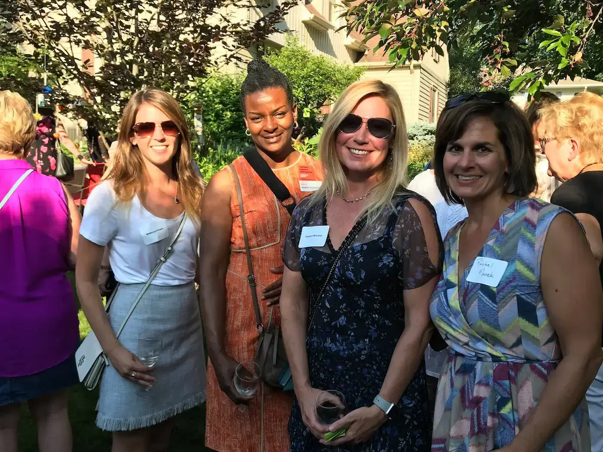 Group of women attending an after-hours event outdoors