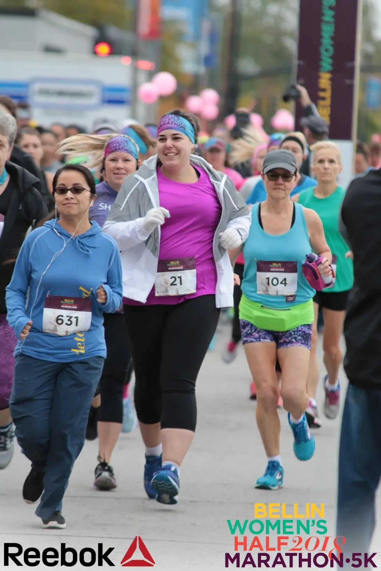 Diverse group of women running the Bellin Women's Half Marathon and 5k