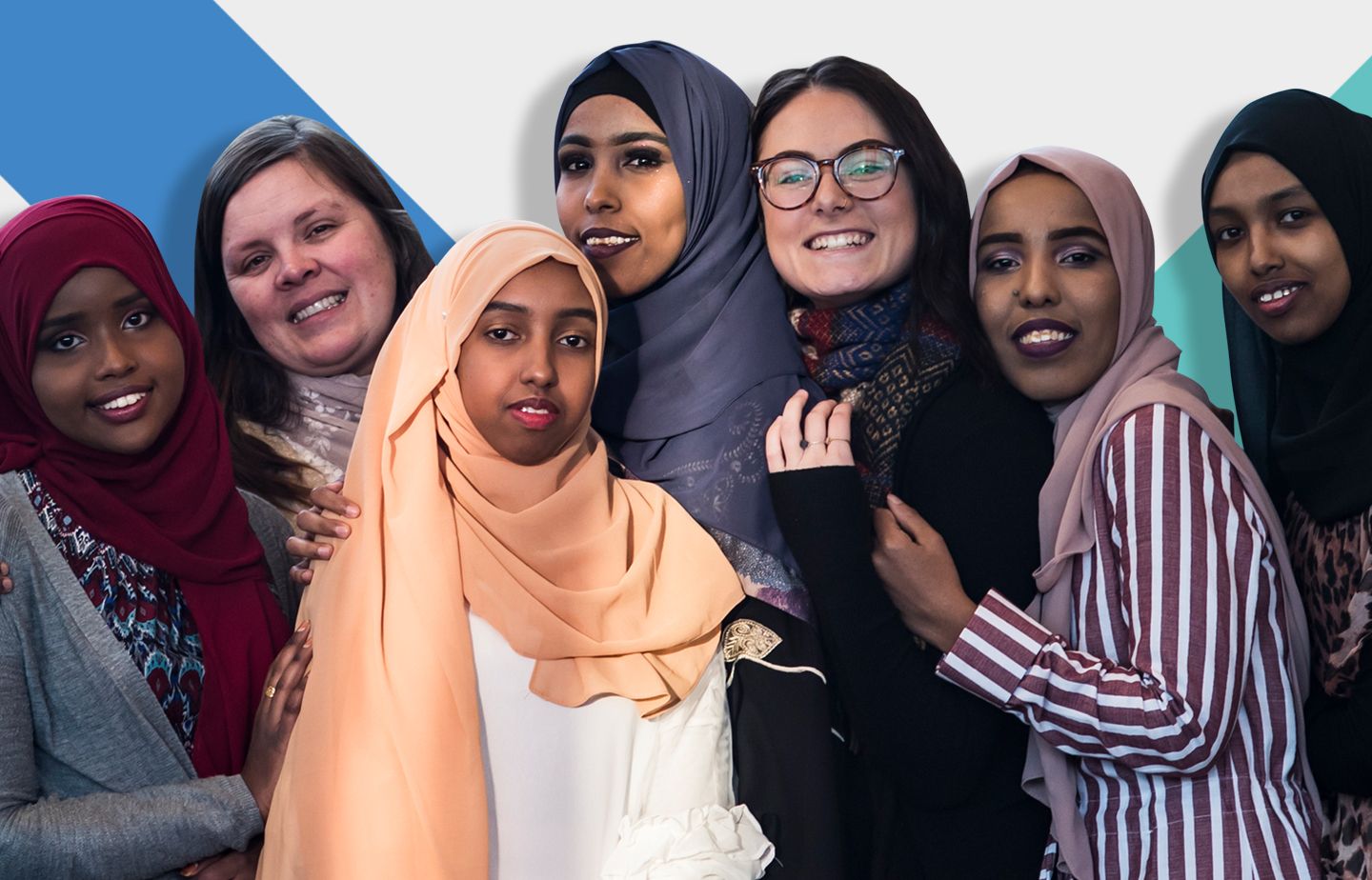 Diverse group of young women smiling and looking at the camera